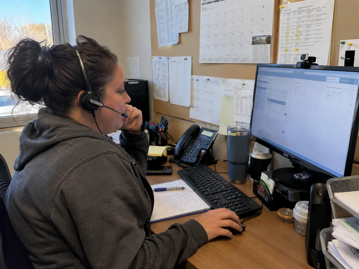 Friendly dispatcher assisting an electrical service customer