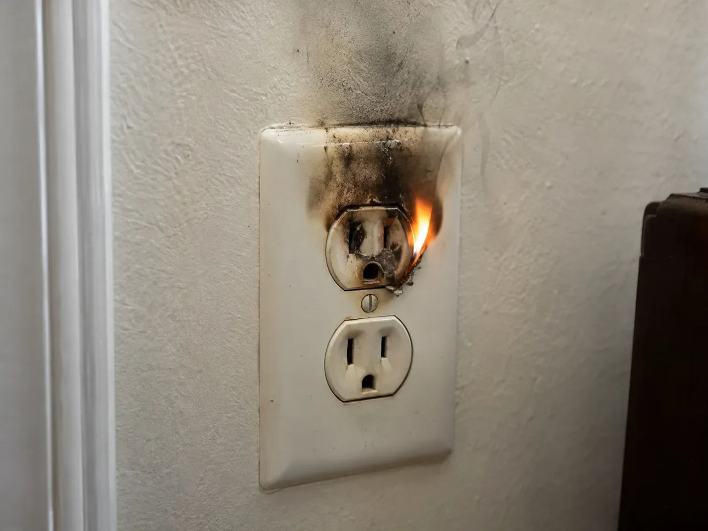 Emergency electrician in Markham inspecting a residential electrical panel